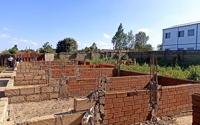 Commercial Plot For Sale Thogoto (with 4-floor Foundation For Bedsitters)