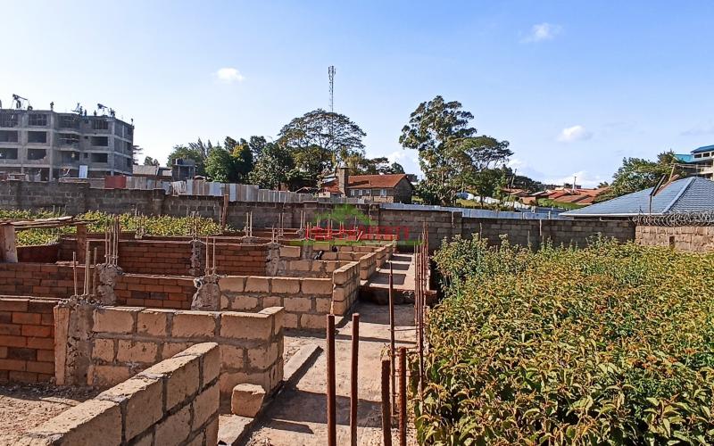 Commercial Plot For Sale Thogoto (with 4-floor Foundation For Bedsitters)